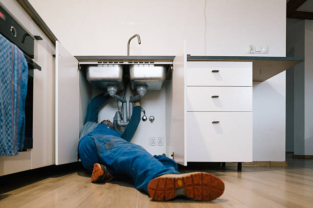 Professional Emergency Plumber technician working in Danville, AR